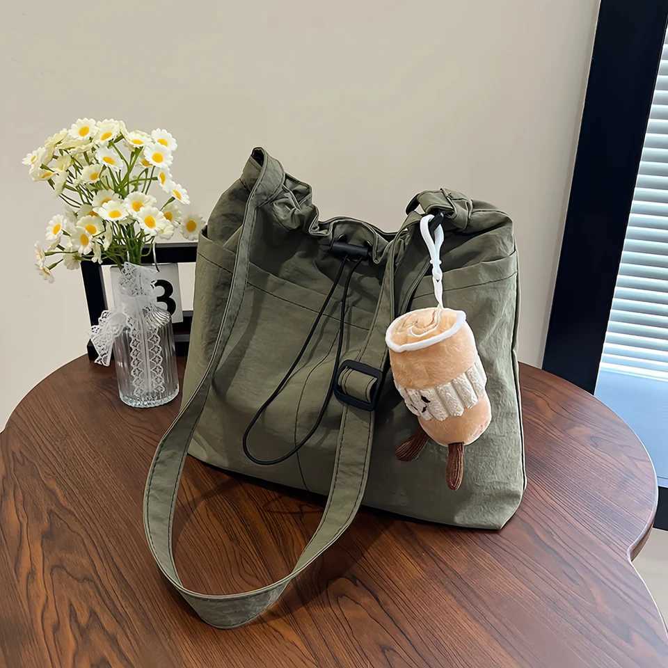Womens bucket bag with top drawstring closure - Spacious nylon textured tote bag for casual outings and travel essentials-tan Y250819