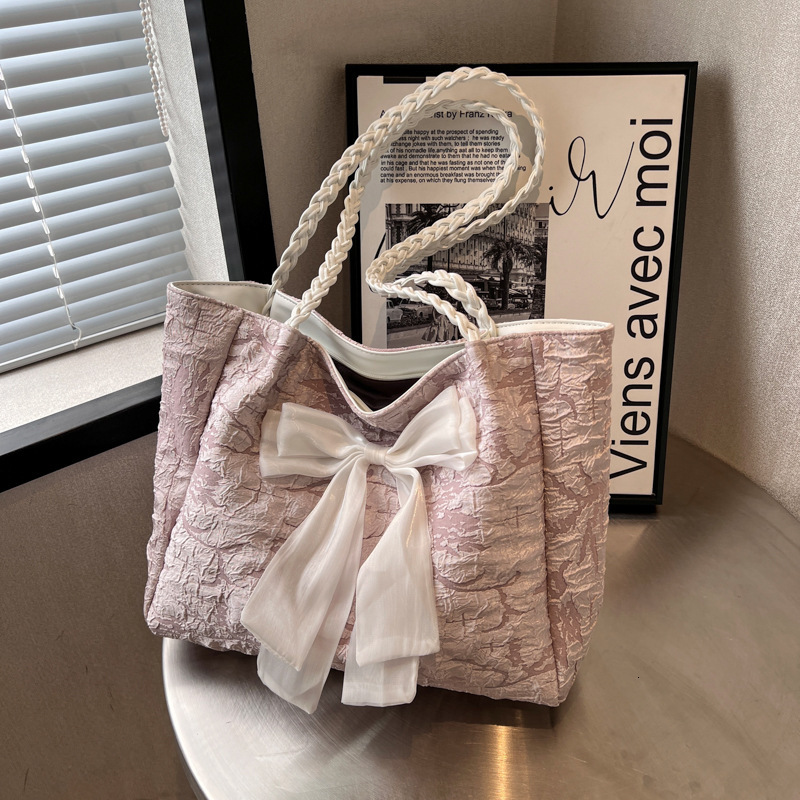 2025 autumn women's bag niche design knitted bow color blocked shoulder bag casual travel handbag handbag women's bag women's crossbody
