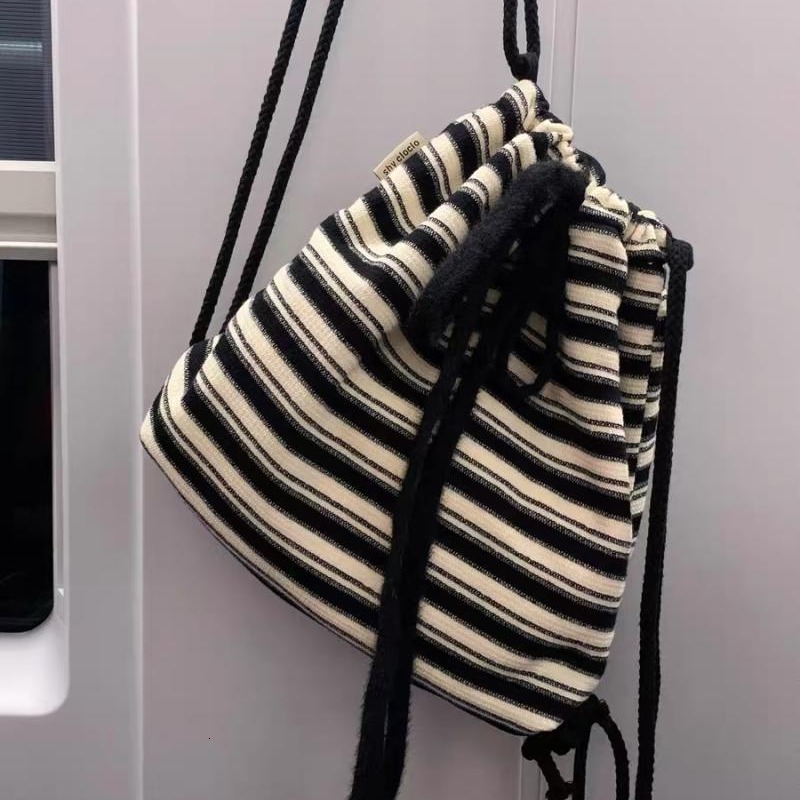 2025 Autumn Leisure Lazy Style Black and White Striped Backpack New Knitted Bag Commuter Large Capacity Handbag Women's Crossbody Bag Designer Ba