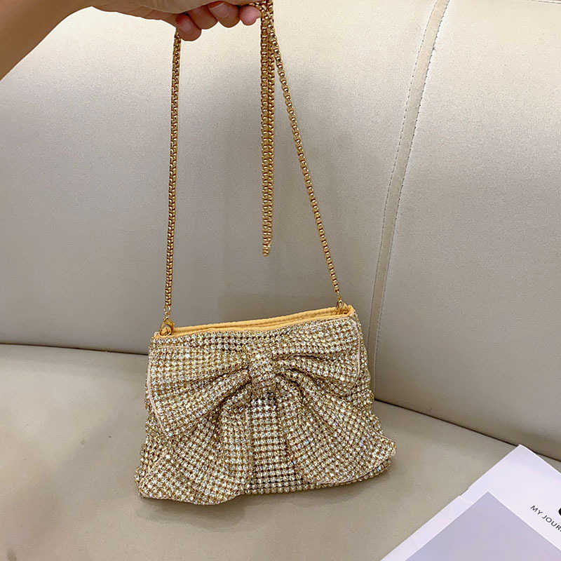 Fashionable, shiny, non functional, rhinestone, big bow, elegant and luxurious, ladies and socialites, evening party, hand-held crossbody bag