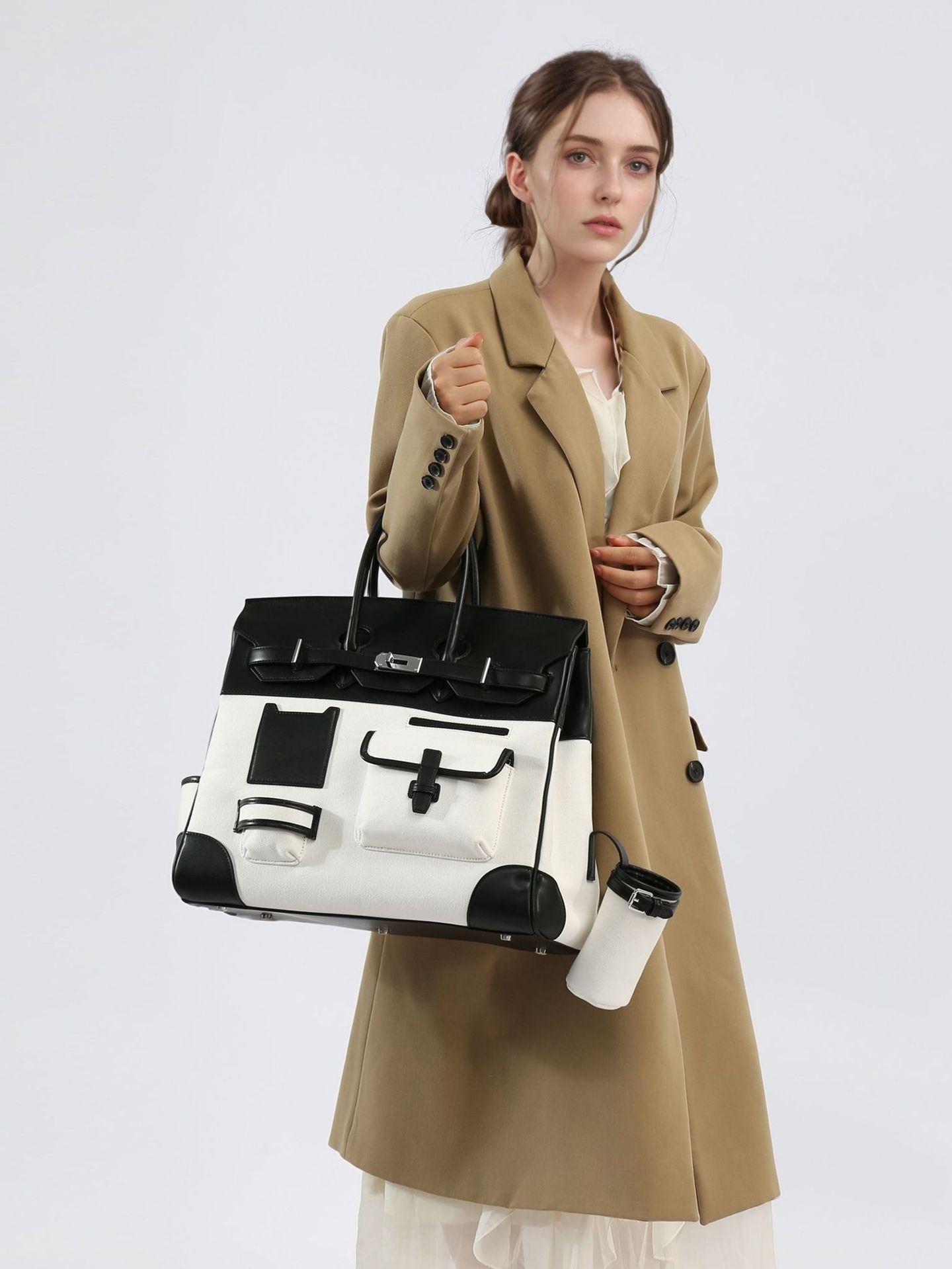 2025 designer bag Luxurys bags fashion women female shoulder handbags leather tote bags large capacity Hot Wing Tote Female Large Commuter Shoulder Ba