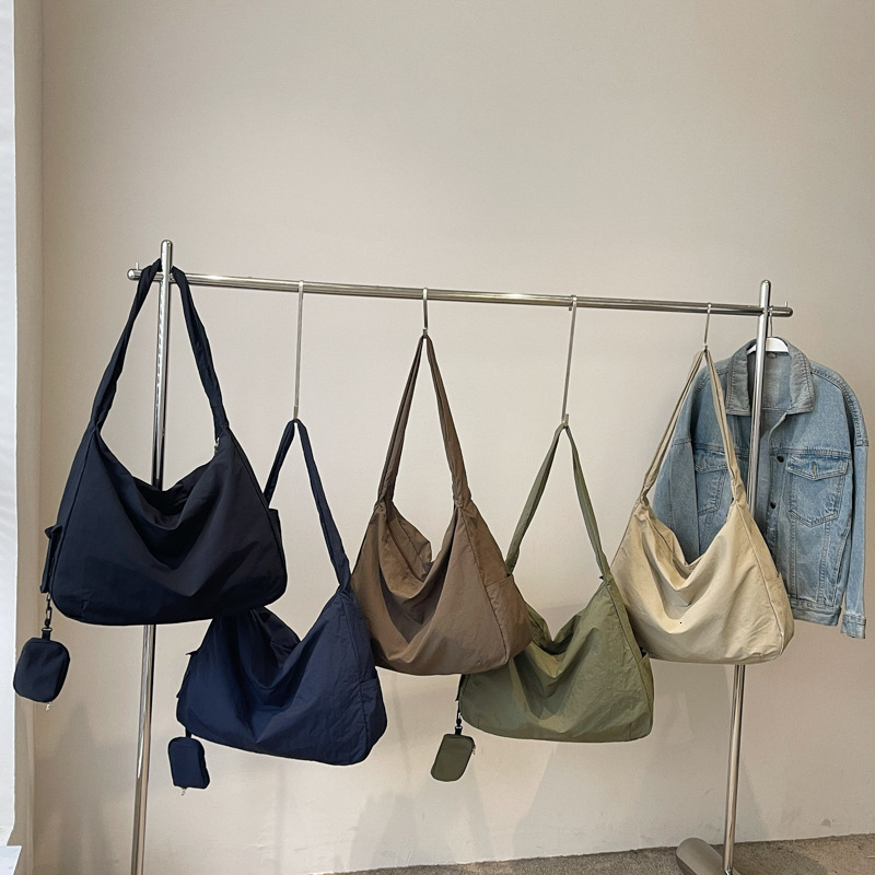 2025 autumn lazy style dumpling bag crossbody bag women's casual sports shoulder bag lightweight waterproof Oxford cloth handbag women's cro