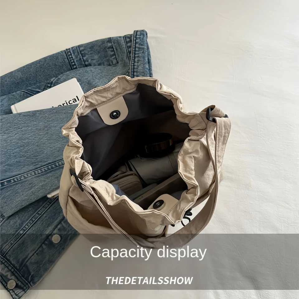 Womens bucket bag with top drawstring closure - Spacious nylon textured tote bag for casual outings and travel essentials-tan Y250819