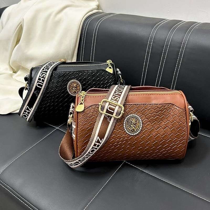 Leather women's shoulder crossbody pillow barrel woven bag