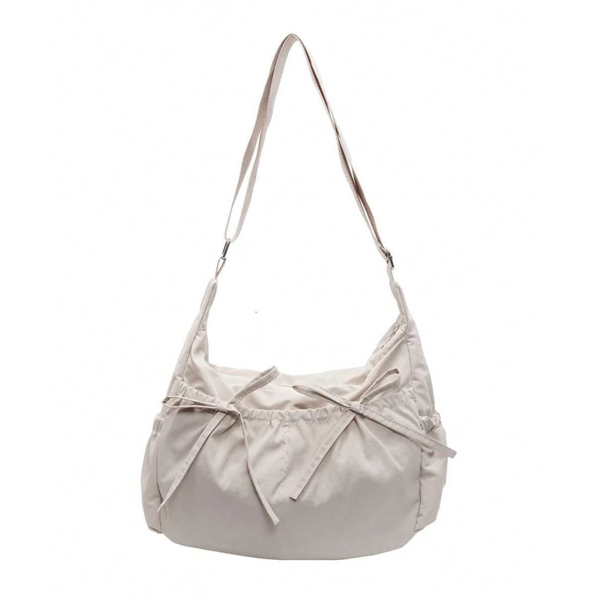 Casual simple and lightweight womens messenger bag niche pleated design bow tote bag large capacity Y250819