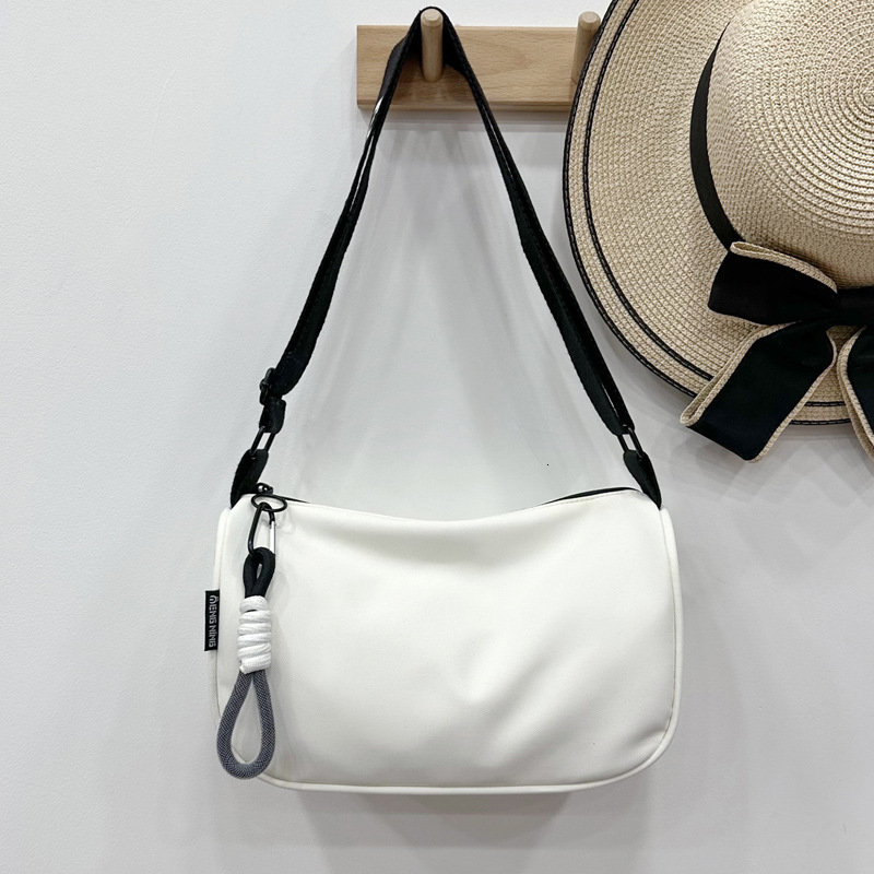 2025 autumn waterproof Oxford cloth women's dumpling bag large capacity lightweight crossbody bag niche design sports and leisure bag women'