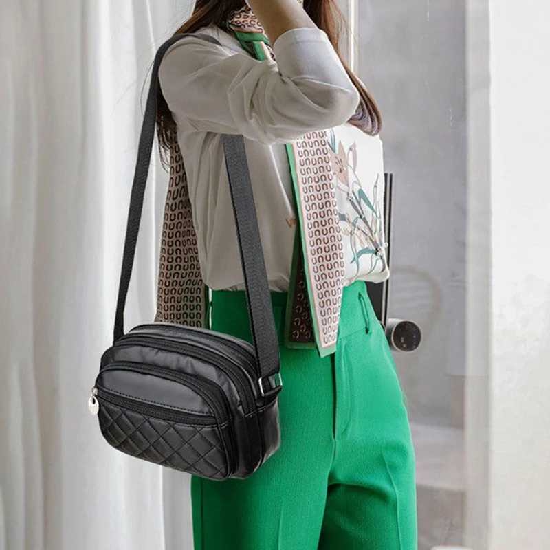 Neutral style shoulder bag for men and women. Multi-layered pockets made of PU material. Suitable for travel and gift giving. Y250819