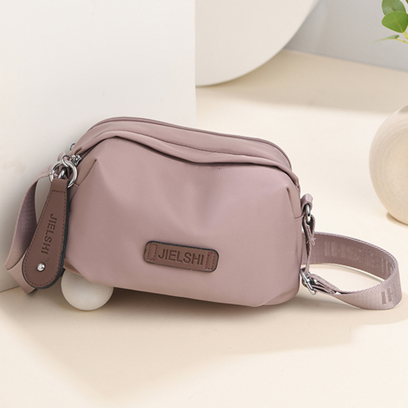 2025 Autumn New Women's Casual Shoulder Bag Japanese Style Fashion Solid Color Oxford Cloth Waterproof Simple Fashion Crossbody Bag Women's 