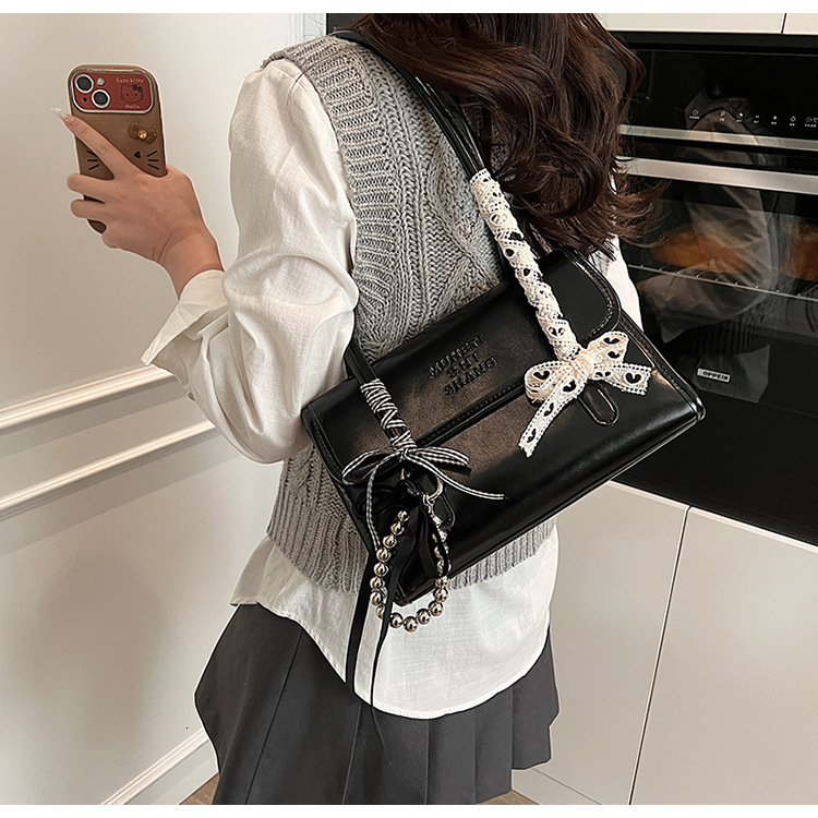 2025 Autumn Large Capacity Women's Bag New Simple Korean Edition Small and Unique Single Shoulder Underarm Bag Male Wenbao Women's Crossbody