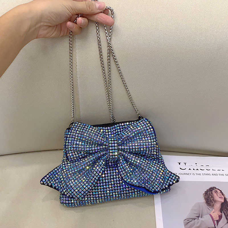 Fashionable, shiny, non functional, rhinestone, big bow, elegant and luxurious, ladies and socialites, evening party, hand-held crossbody bag