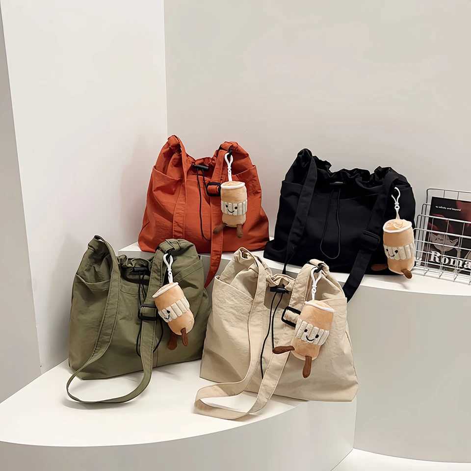 Womens bucket bag with top drawstring closure - Spacious nylon textured tote bag for casual outings and travel essentials-tan Y250819