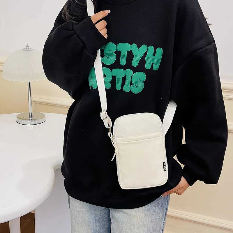 New Fashion Simple Casual Shoulder Messenger Bag Womens Portable Mobile Phone Bag Vertical Coin Key Bank Card Shoulder Bag Y250819