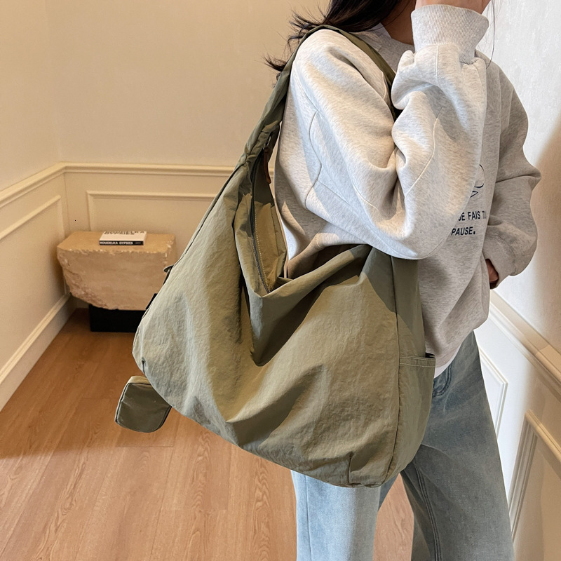 2025 autumn lazy style dumpling bag crossbody bag women's casual sports shoulder bag lightweight waterproof Oxford cloth handbag women's cro