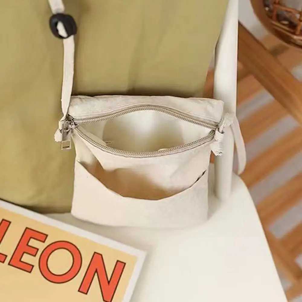 New Nylon Fabric Cell Phone Bag Lightweight Solid Color Shoulder Bag Thin Strap Crossbody Bag Women Y250819