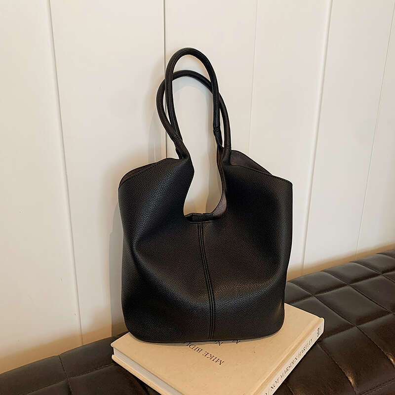 Handheld Simple Niche Design Large Bags Capacity Bucket for Women Designer 2025 Summer New Commuting Shoulder Bag