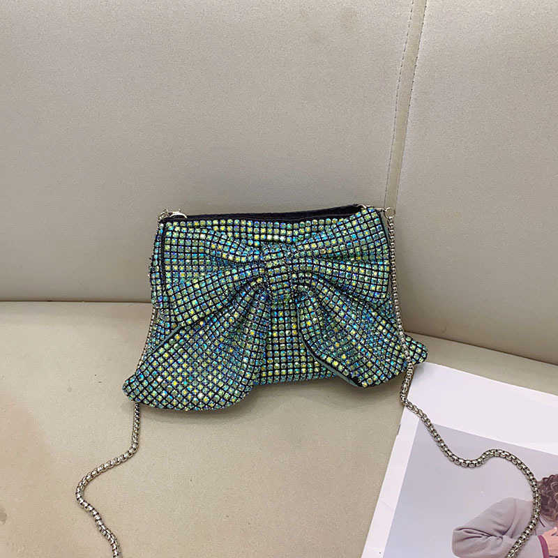Fashionable, shiny, non functional, rhinestone, big bow, elegant and luxurious, ladies and socialites, evening party, hand-held crossbody bag