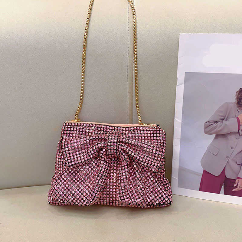 Fashionable, shiny, non functional, rhinestone, big bow, elegant and luxurious, ladies and socialites, evening party, hand-held crossbody bag