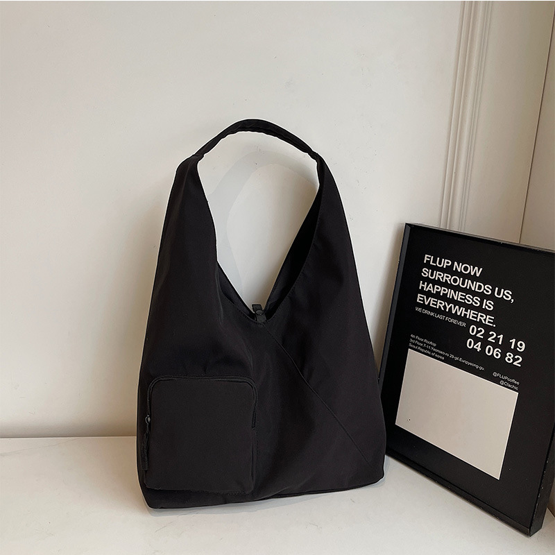 2025 Autumn Japanese style unprinted shoulder bag triangle bag large capacity crossbody bag commuting handbag women's canvas bag women's cro