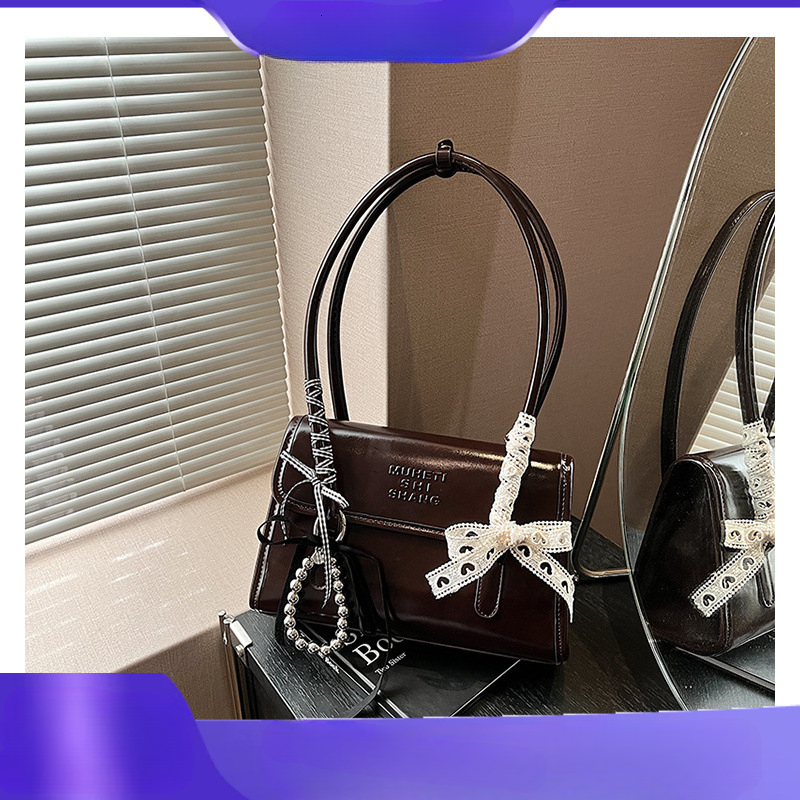 2025 Autumn Large Capacity Women's Bag New Simple Korean Edition Small and Unique Single Shoulder Underarm Bag Male Wenbao Women's Crossbody