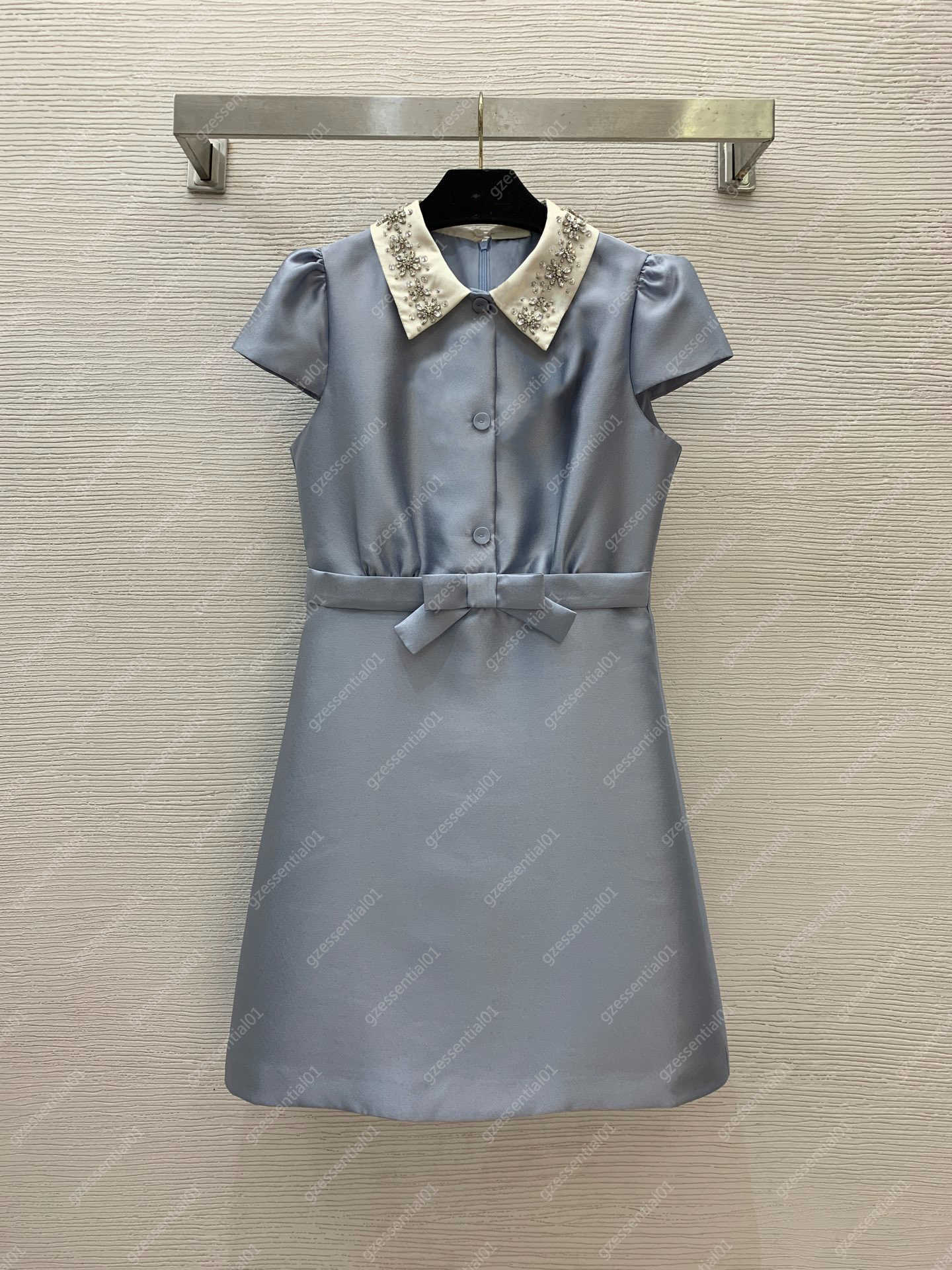 designer dresses Elegant ladies dress with rhinestone-studded beaded collar half-button placket bow detail and A-line silhouette with capped sleeves ladies dresses