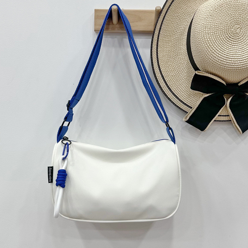 2025 autumn waterproof Oxford cloth women's dumpling bag large capacity lightweight crossbody bag niche design sports and leisure bag women'