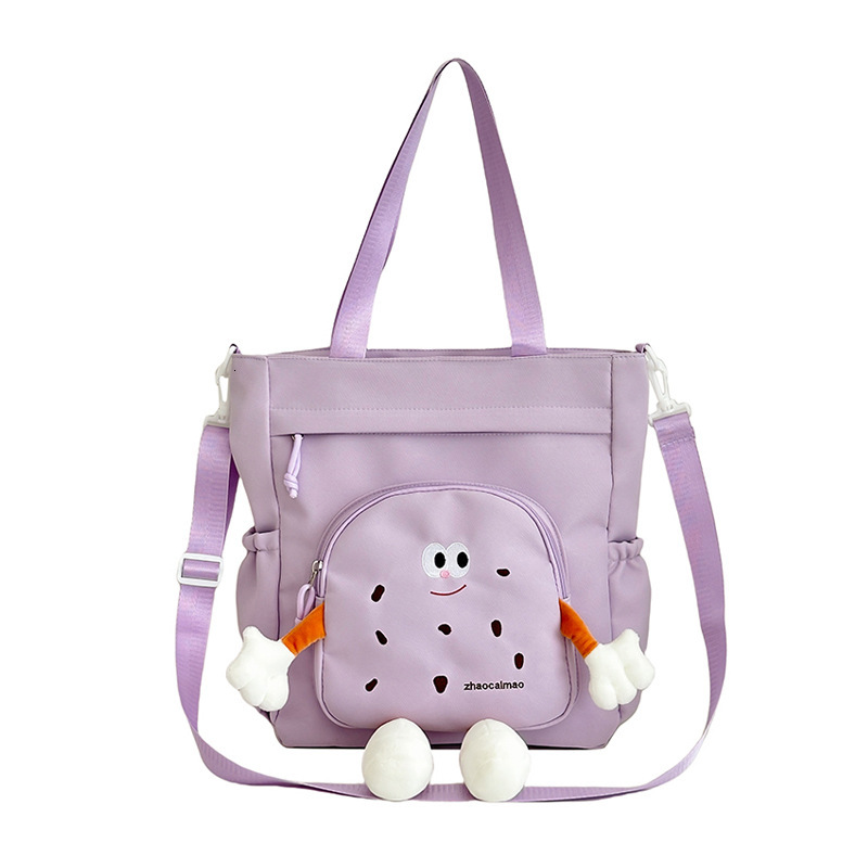 2025 Autumn Cute Canvas Bag Biscuit Biscuit Crossbody Bag Design Shiny Nylon Shoulder Bag Large Capacity Bag Women's Crossbody Bag Designer Bag W