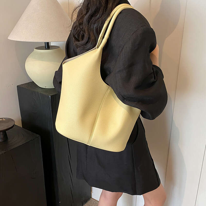 Handheld Simple Niche Design Large Bags Capacity Bucket for Women Designer 2025 Summer New Commuting Shoulder Bag