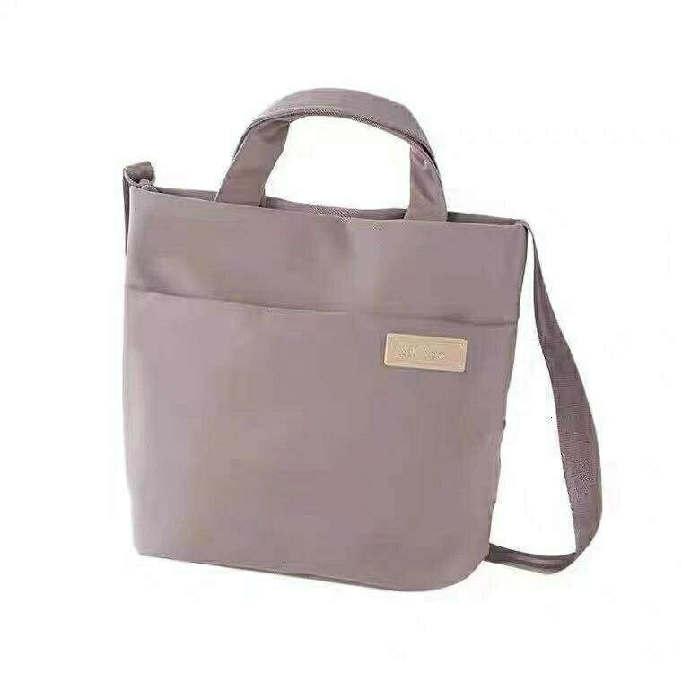 2025 New Versatile Casual Handbag Single Shoulder Crossbody Large Capacity Commuter Student Storage Female Tote Bag