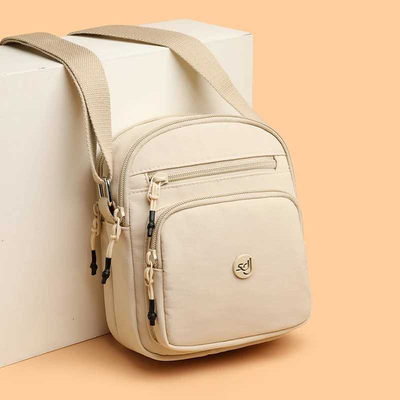 Minimalist Style Lightweight Drawstring Canvas Small Bag Versatile Mini Single-Shoulder Crossbody Coin Purse for Mobile Phones Y250819