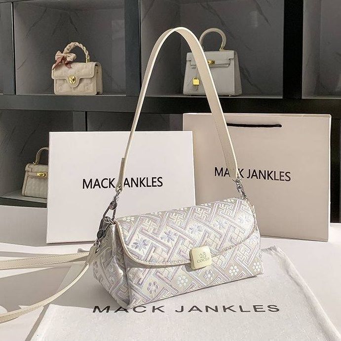 Free Shipping Designer Genuine Leather Women's Armpit Bag Fashion Embroidered Handbag Commuting Single Shoulder Baguette Bag Mom Bag