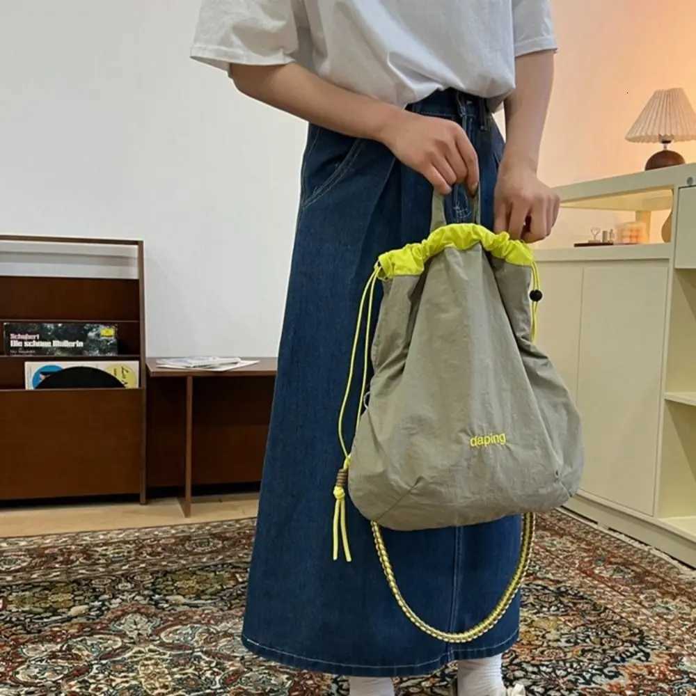 Leisure Lightweight Shoulder Bag Letter Contrast Color Crossbody Bag Large Capacity Nylon Drawstring Bag Y250819