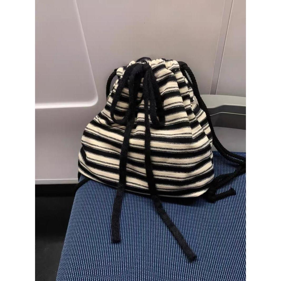 2025 Autumn Leisure Lazy Style Black and White Striped Backpack New Knitted Bag Commuter Large Capacity Handbag Women's Crossbody Bag Designer Ba