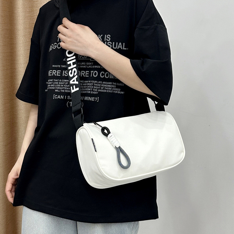 2025 autumn waterproof Oxford cloth women's dumpling bag large capacity lightweight crossbody bag niche design sports and leisure bag women'