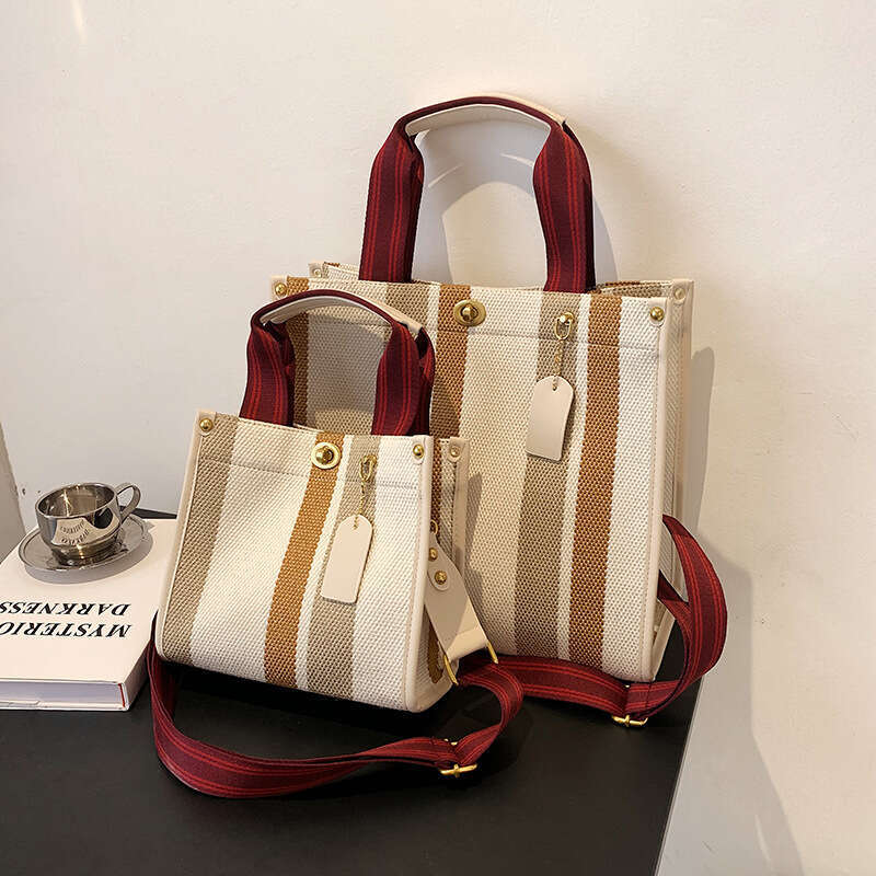 2025 New Women's Handbag Tote Bag Trendy Canvas Striped Student Shoulder Crossbody Backpack