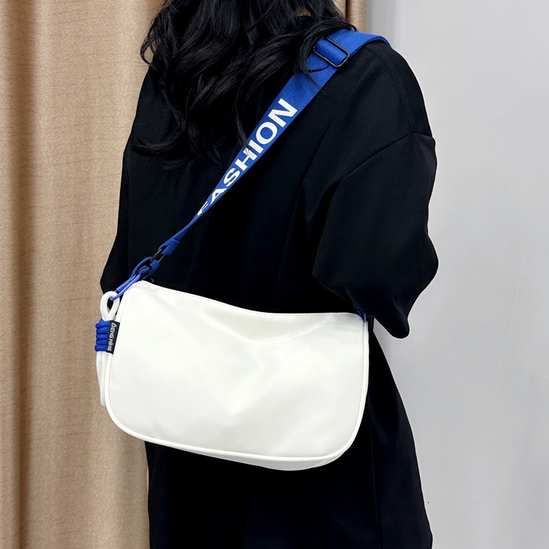 2025 autumn waterproof Oxford cloth women's dumpling bag large capacity lightweight crossbody bag niche design sports and leisure bag women'