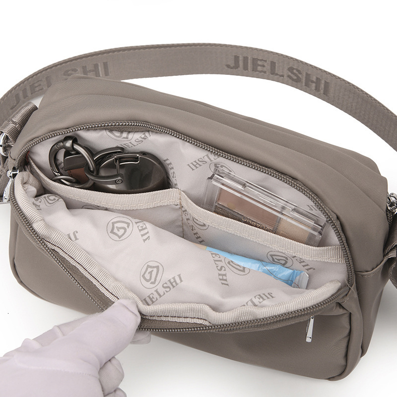 2025 Autumn New Women's Casual Shoulder Bag Japanese Style Fashion Solid Color Oxford Cloth Waterproof Simple Fashion Crossbody Bag Women's 