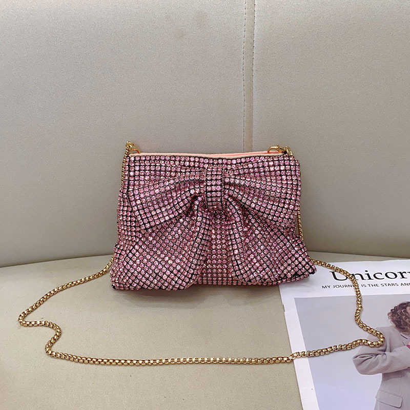 Fashionable, shiny, non functional, rhinestone, big bow, elegant and luxurious, ladies and socialites, evening party, hand-held crossbody bag
