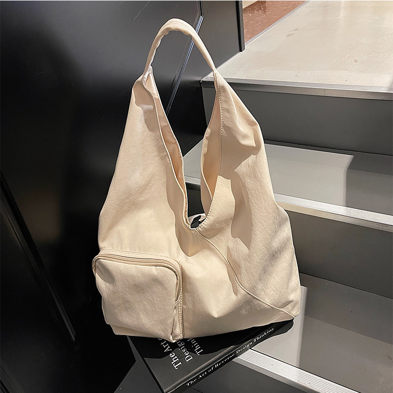 2025 Autumn Japanese style unprinted shoulder bag triangle bag large capacity crossbody bag commuting handbag women's canvas bag women's cro