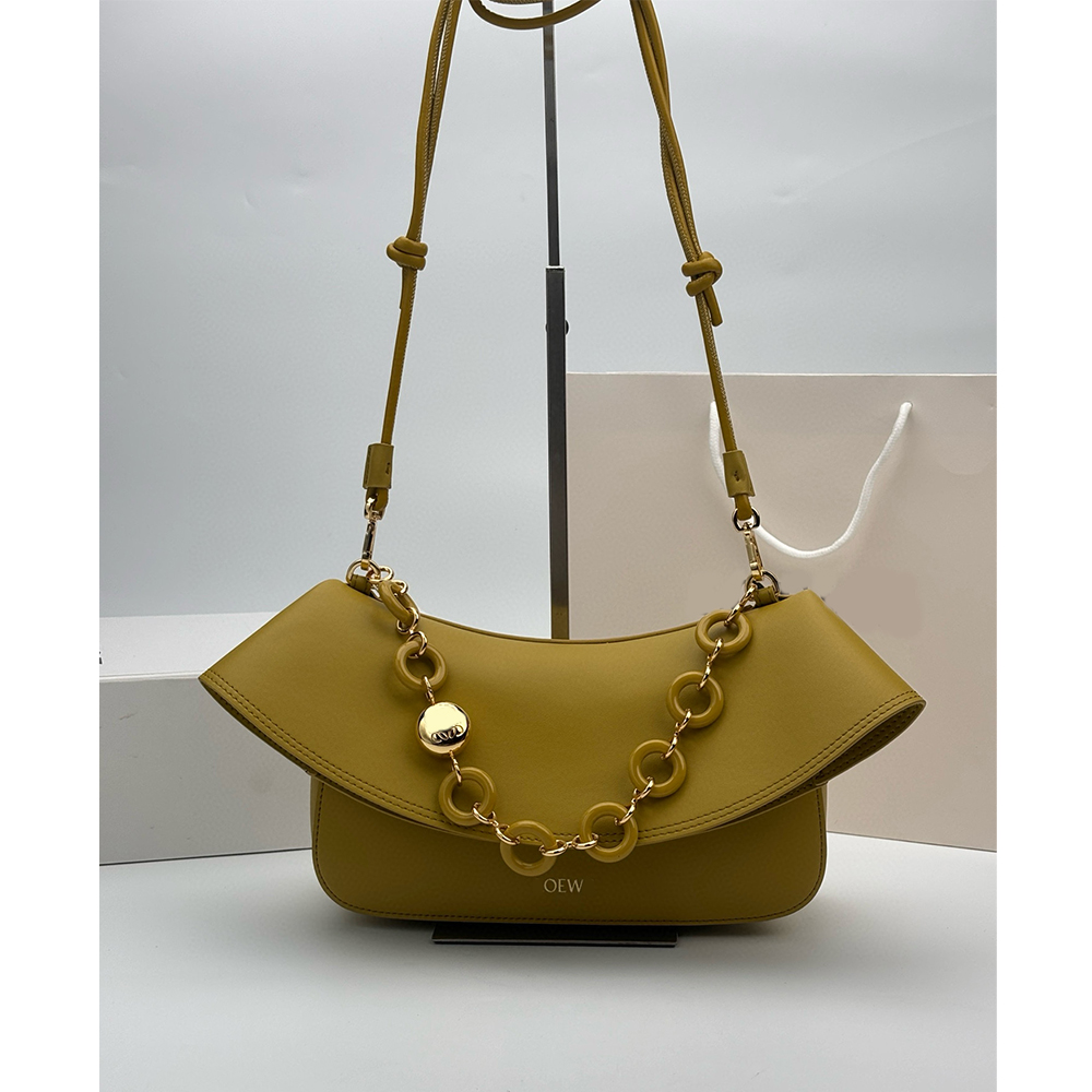 Medium Ola bags in smooth genuine leather summer defined by curved body statement donut chain flap closure designer bags shoulder womens crossbody anagram MB5977