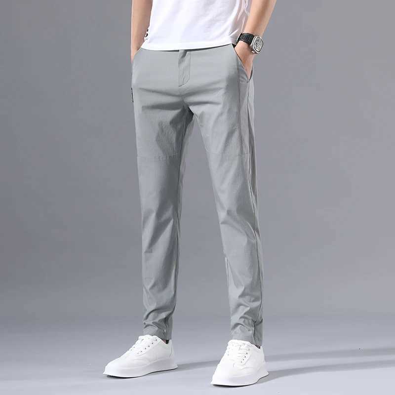 2025 Mens Casual Pants Slim Fit Stretch Classic Chino Trousers Male Stretch Elastic Korean Summer Dress Ice Light Thin Business XJ250821
