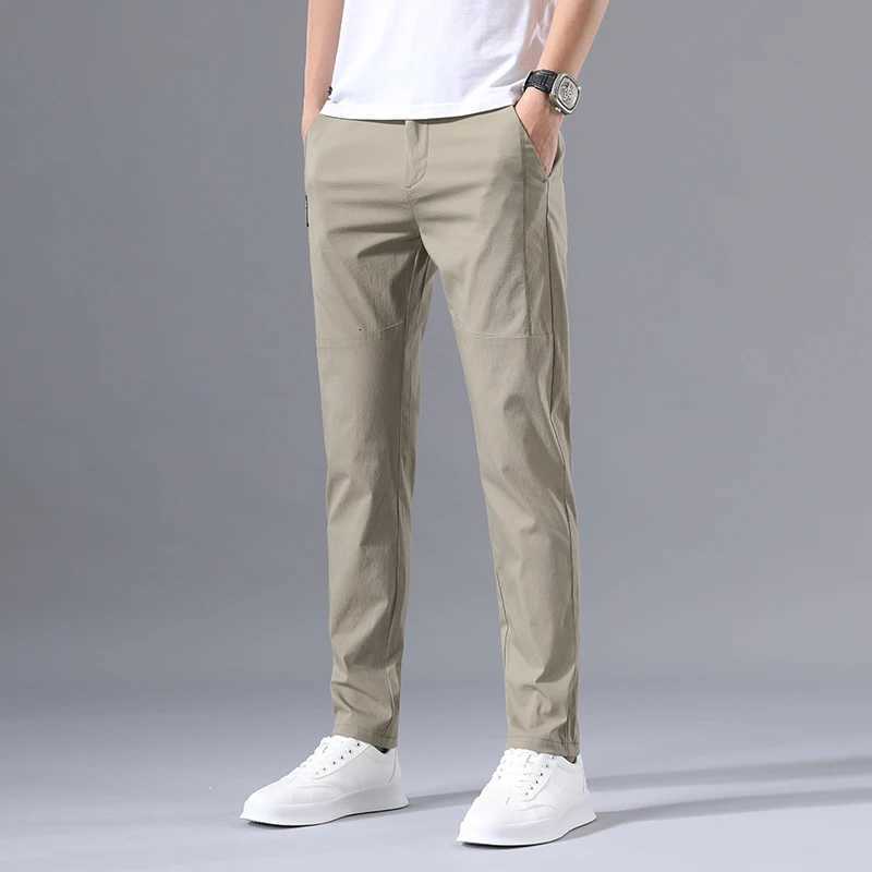 2025 Mens Casual Pants Slim Fit Stretch Classic Chino Trousers Male Stretch Elastic Korean Summer Dress Ice Light Thin Business XJ250821