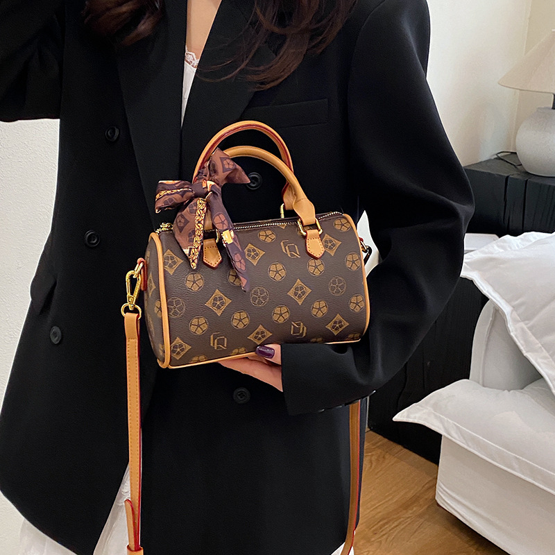 Free shipping designer bags hot selling New vintage hand-held cylindrical bag versatile single shoulder diagonal cross bag