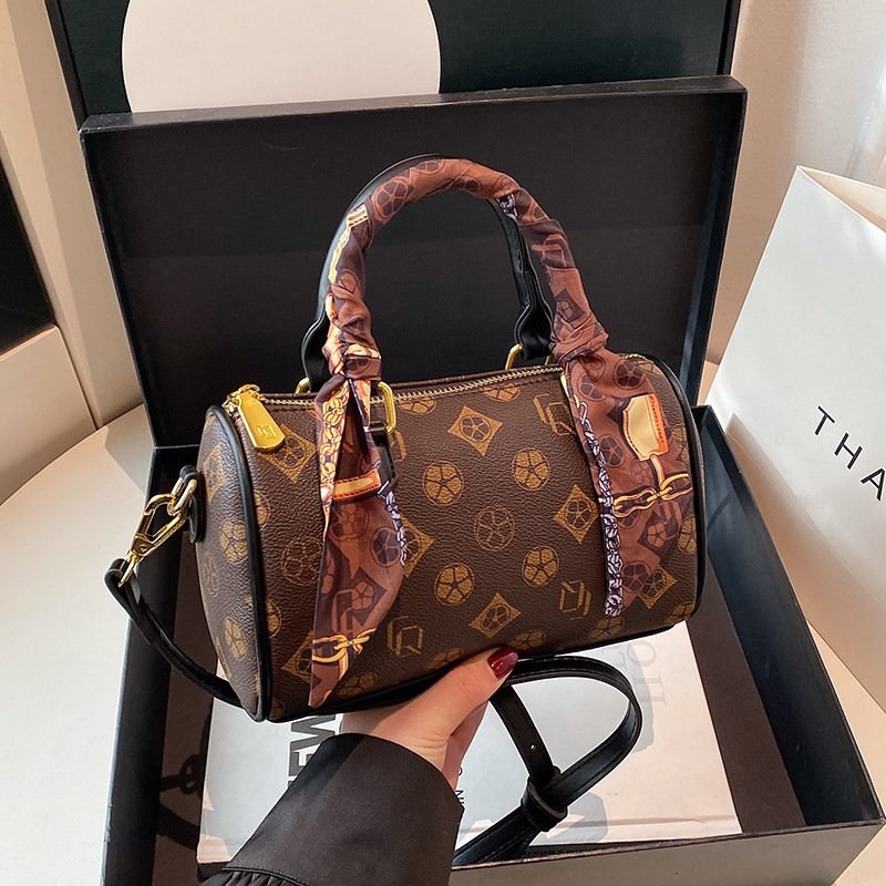 Free shipping designer bags hot selling New vintage hand-held cylindrical bag versatile single shoulder diagonal cross bag