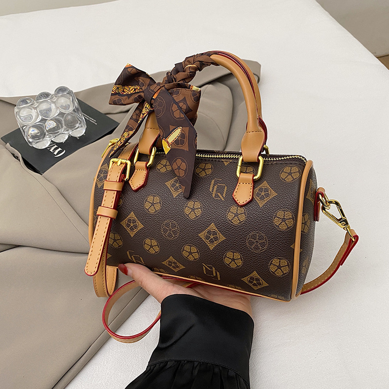 Free shipping designer bags hot selling New vintage hand-held cylindrical bag versatile single shoulder diagonal cross bag
