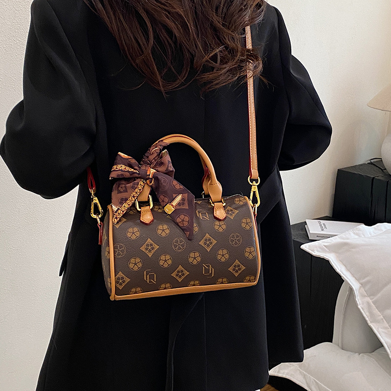 Free shipping designer bags hot selling New vintage hand-held cylindrical bag versatile single shoulder diagonal cross bag