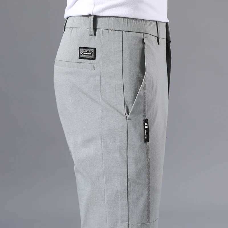 2025 Mens Casual Pants Slim Fit Stretch Classic Chino Trousers Male Stretch Elastic Korean Summer Dress Ice Light Thin Business XJ250821