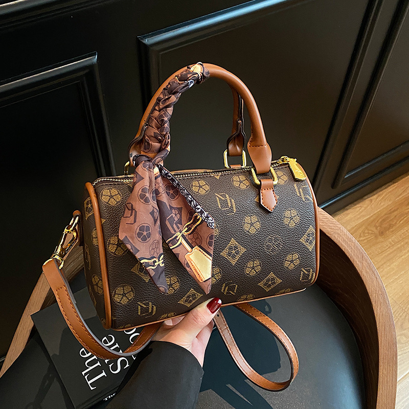 Free shipping designer bags hot selling New vintage hand-held cylindrical bag versatile single shoulder diagonal cross bag