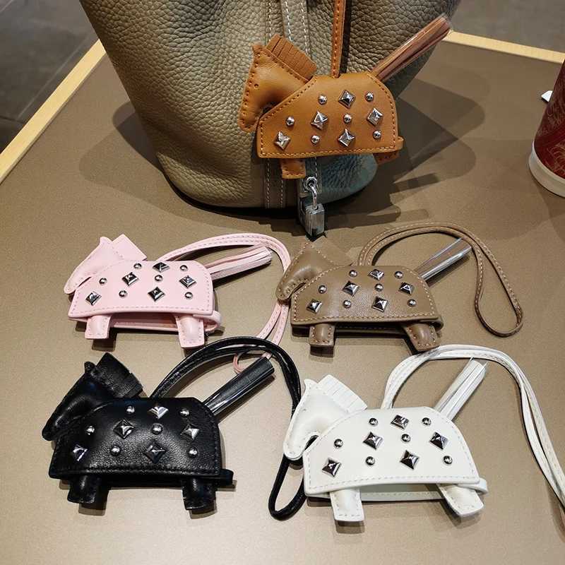 Soft Leather Pony Pendant Car Pendant Key designer Pendant Handmade Leather New Rivets War Horse Bag Charm Bag Charm Leather XJ250822
