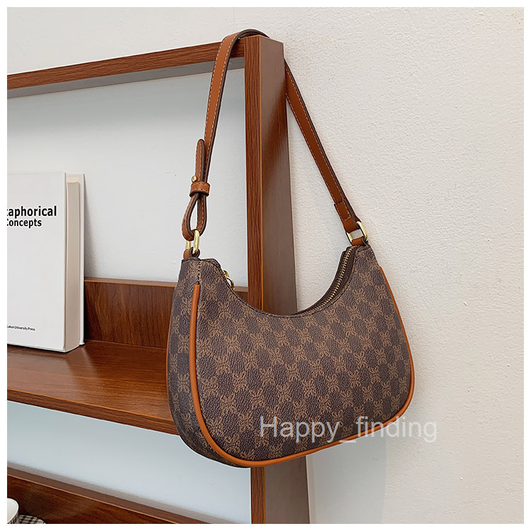 Small bag female new fashion French minority design advanced feeling single shoulder armpit bag handle stick bag