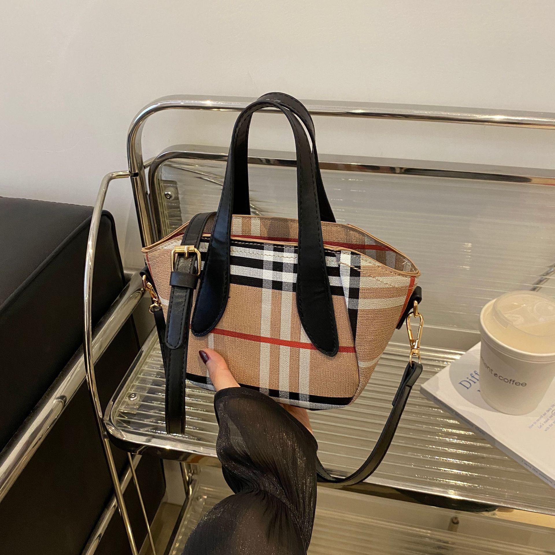 Elegant women's bag 2025 minimalist design new shoulder bag versatile high-end striped splicing handbag black white free shipping